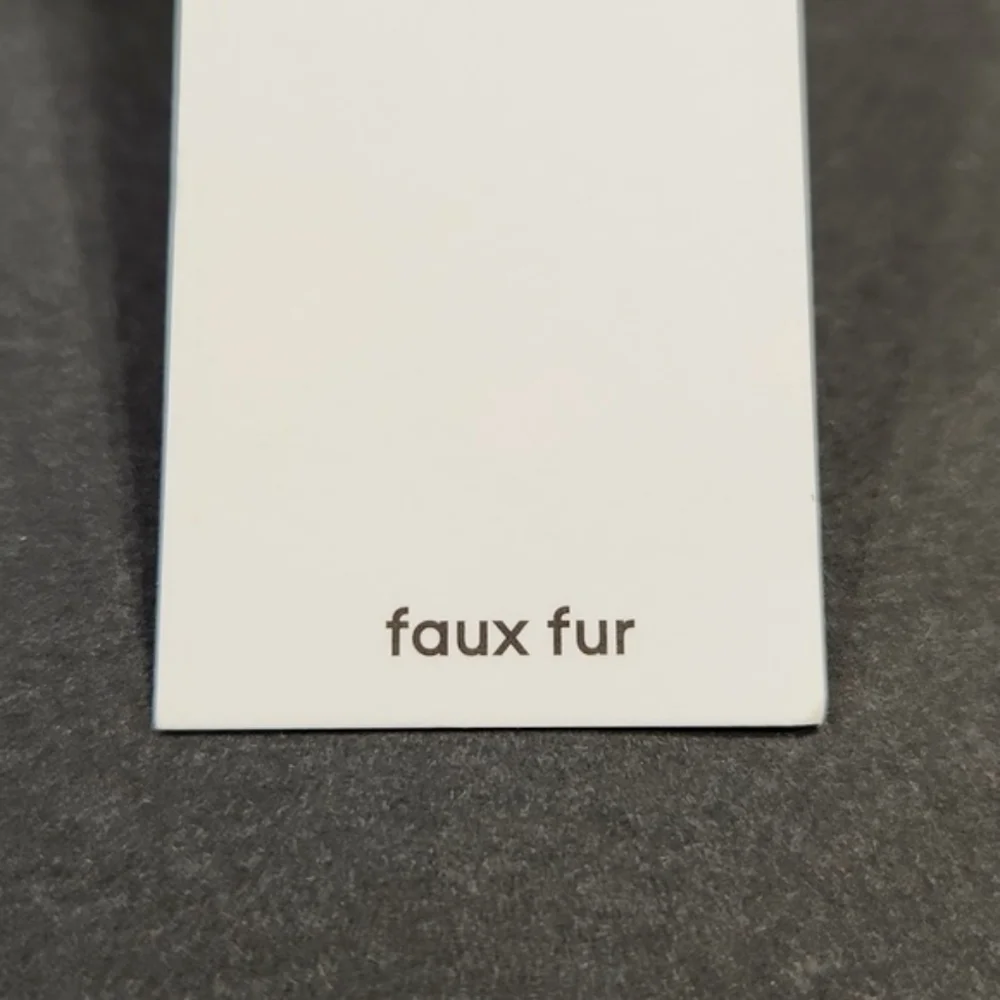 NWT Calvin Klein Cream Faux Fur Pom-Pom Knit Beanie Hat One Size MSRP $48 - Picture 7 of 10